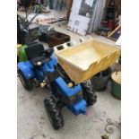 A CHILDS PEDAL TRACTOR WITH FORE END LOADER