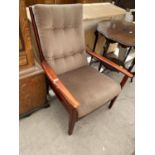 A PARKER KNOLL STYLE FIRESIDE CHAIR