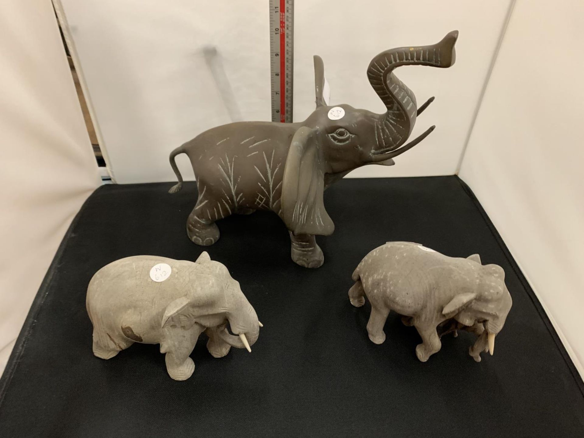 A LARGE BRASS ELEPHANT AND TWO SMALLER WOODEN ELEPHANTS - Image 2 of 2