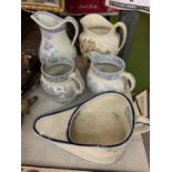 TWO LARGE WATER JUGS, TWO MEDIUM BLUE AND WHITE WATER JUGS AND A VINTAGE CERAMIC BED PAN