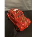 A LARGE SIGNED ANITA HARRIS HAND PAINTED VW BEETLE