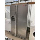 A SAMSUNG AMERICAN STYLE FRIDGE FREEZER, BELIEVED IN WORKING ORDER, NO WARRANTY