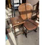 A VICTORIAN CANE BACK ROCKING CHAIR AND SMALL SQUARE OCCASIONAL TABLE