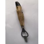 A ROE DEER FOOT BOTTLE OPENER