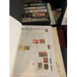 TWO ALBUMS CONTAINING A LARGE QUANTITY OF STAMPS