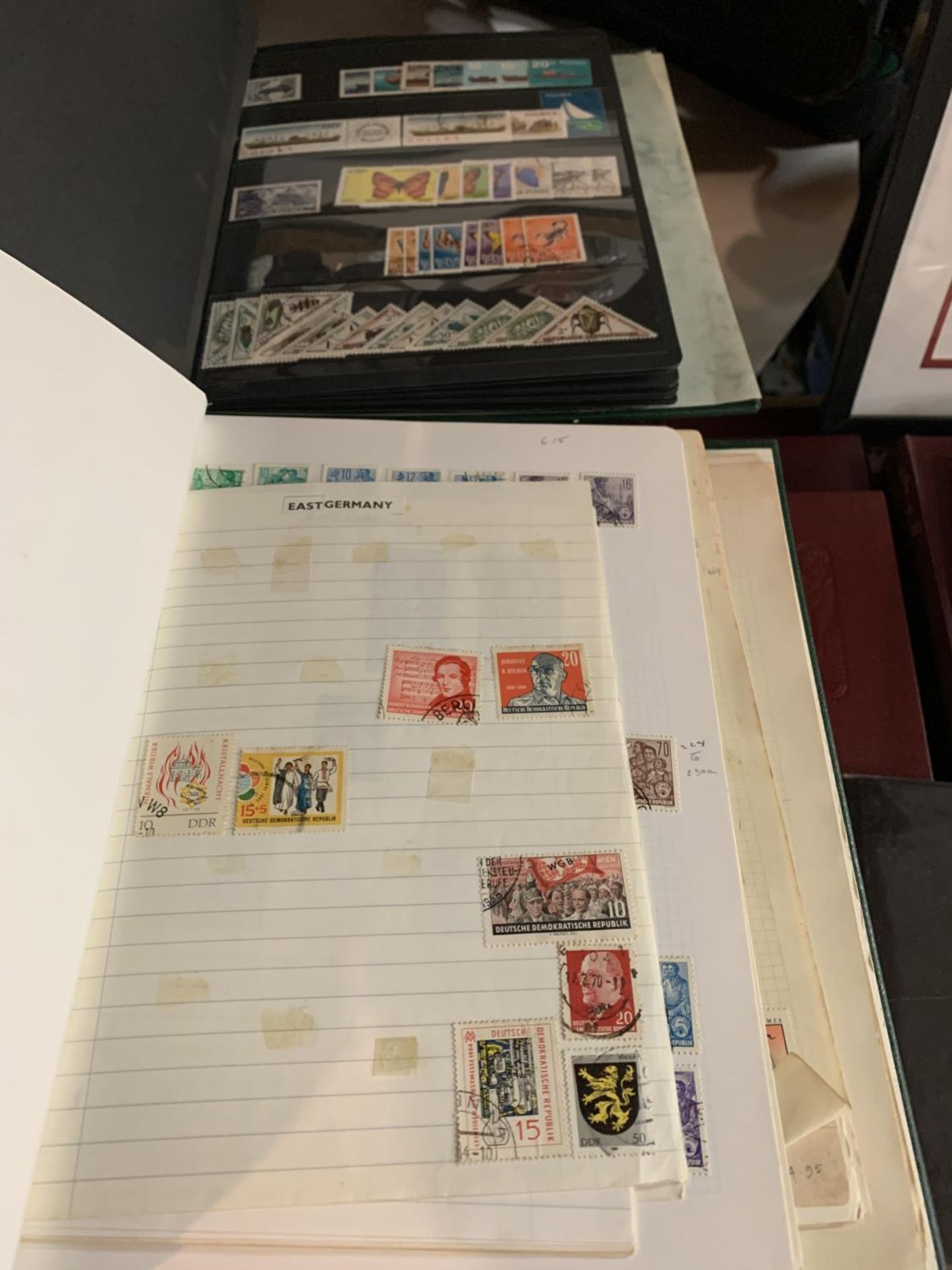 TWO ALBUMS CONTAINING A LARGE QUANTITY OF STAMPS