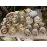 A LARGE SELECTION OF CHINA TEA SETS TO INCLUDE TWO TEAPOTS (SOME A/F)