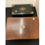 A BLACK LACQUERED JEWELLERY BOX WITH GILT EDGES AND A MAHOGANY WOODEN WRING SLOPE