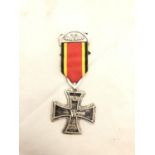 A GERMAN MEDAL AND RIBBON