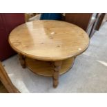 A MODERN CIRCULAR PINE TWO TIER COFFEE TABLE, 30" DIAMETER