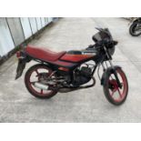 A 1987 KAWASAKI AR 50, ON A V5, BELIEVED GENUINE 1384 MILES, ENGINE KICKS OVER, GARAGE STORED FOR