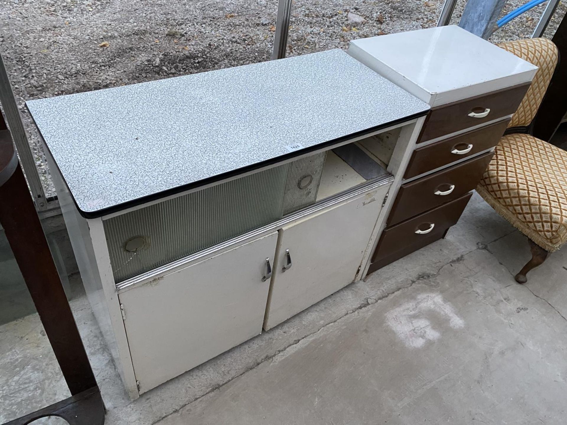 A 1950'S KITCHEN SIDE CABINET WITH CUPBOARDS AND SLIDING GLASS DOORS AND PAINTED FOUR DRAWER CHEST