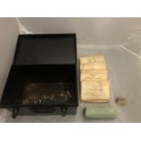 A WORLD WAR II A.R.P. TIN AND A FIRST AID KIT