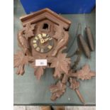 A BAVARIAN STYLE WOODEN CUCKOO CLOCK