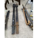 TWO HEAVY VINTAGE CAST IRON POSTS