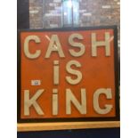 A 'CASH IS KING' ILLUMINATED LIGHT BOX SIGN