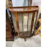 A MAHOGANY BOW FRONT CHINA CABINET ON CABRIOLE SUPPORTS