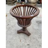 A MAHOGANY BASKET STYLE PLANT STAND