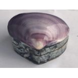 A PURPLE COLOURED SHELL JEWELLERY BOX