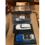 FIVE DIE CAST CARS TO INCLUDE THREE IN CASES
