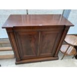 A REGENCY MAHOGANY TWO DOOR BOOKCASE BASE, ON PLATFORM BASE, 42" WIDE