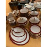 A LARGE ROYAL ALBERT MAROON AND GOLD DINNER SERVICE TO INCLUDE TUREENS