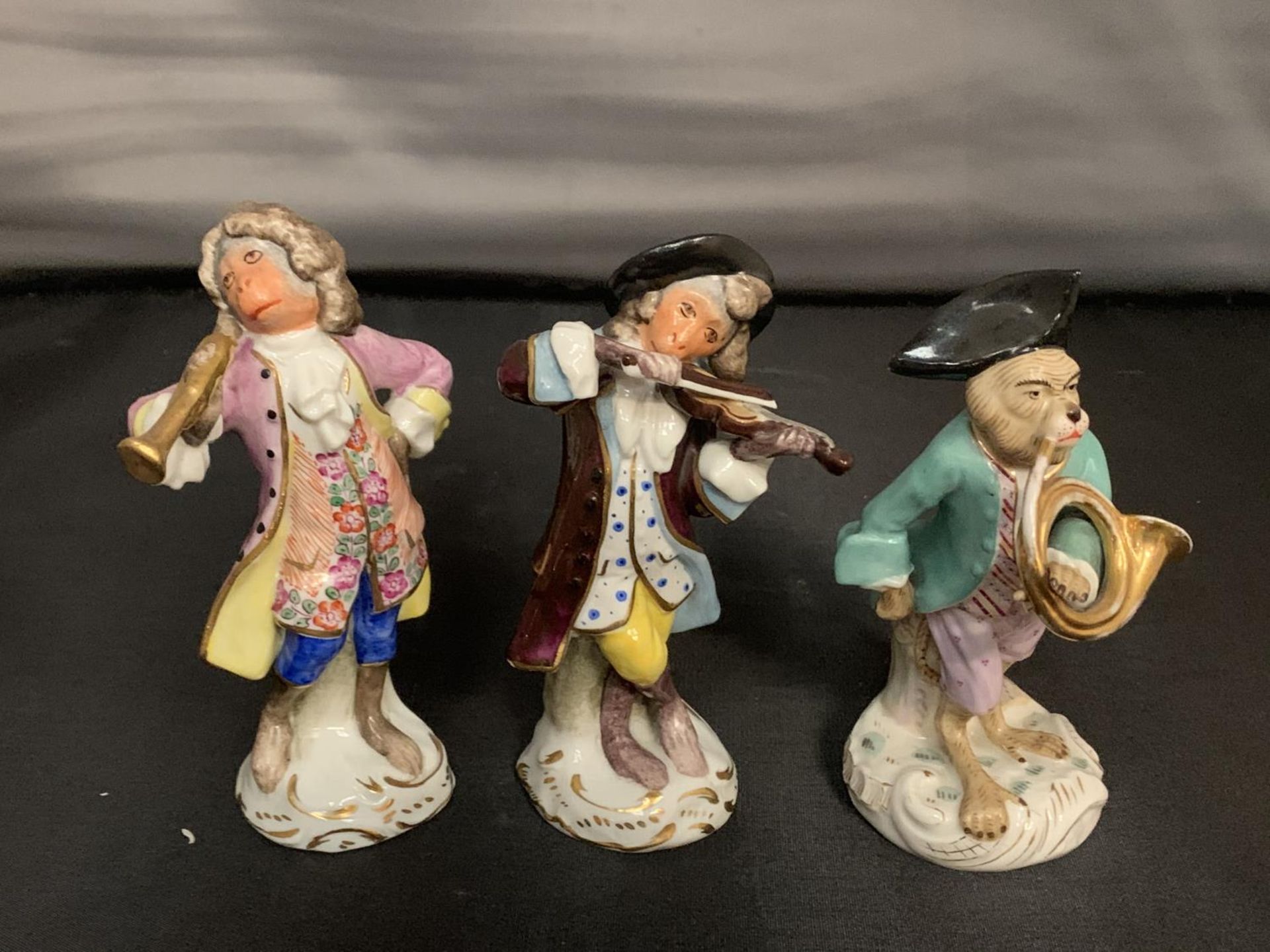 THREE CONTINENTAL FIGURES OF MONKEY MUSICIANS