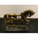 A BRASS HORSE DOORSTOP