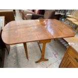 A MODERN YEW WOOD DROP-LEAF TABLE