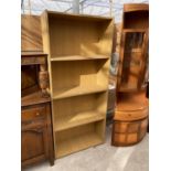 AN OAK EFFECT BOOKCASE