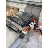 A STIHL HEDGE TRIMMER (SPARES/REPAIRS) AND A TILE CUTTER