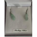 A PAIR OF JADE AND SILVER EARRINGS