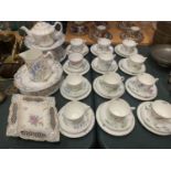 A COLLECTION OF HAND PAINTED TRIOS, CAKE PLATES TEAPOT, JUG ETC