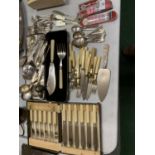 A LARGE QUANTITY OF ASSORTED EPNS CUTLERY, SOME BOXED