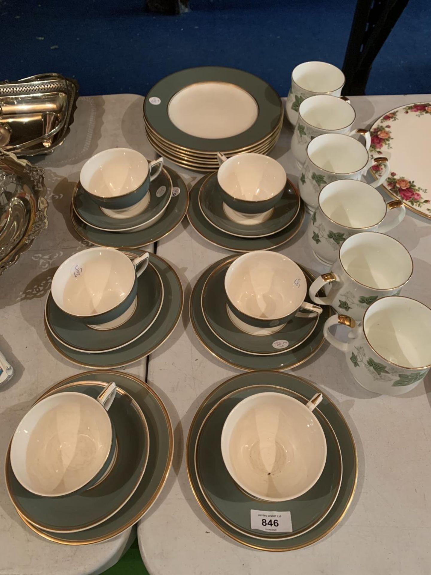 A DUCAL WINDSOR GREEN TEASET WITH SIX CASTLE CHINA MUGS WITH IVY DECORATION