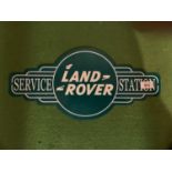 A METAL LAND ROVER SERVICE STATION SIGN
