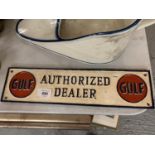 A PAINTED METAL ' GULF AUTHORISED DEALER' ADVERTISING PLAQUE
