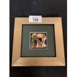 A FRAMED MOORCROFT KING CHARLES SPANIEL PLAQUE