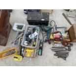 A BOSCH DRILL AND VARIOUS TOOLS