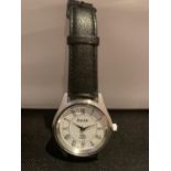 AN EIGER WRIST WATCH IN WORKING ORDER