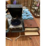 A VINTAGE CASED GRAMOPHONE AND A COLLECTION OF RECORDS