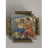 A BRASS HAND PAINTED LIMOGES BROOCH