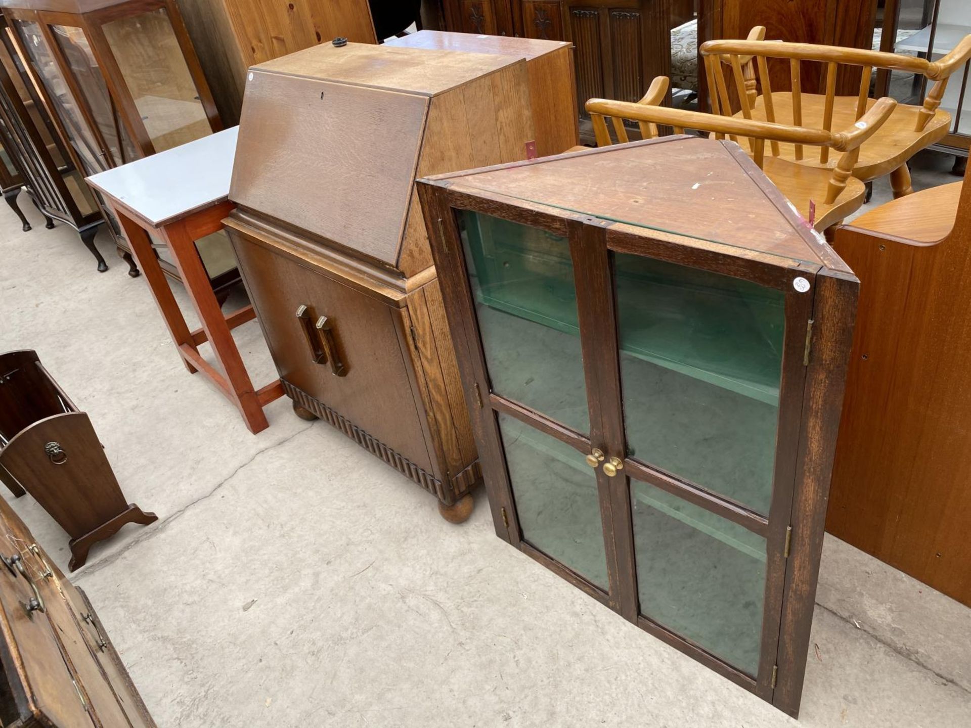 AN OAK BUREAU CORNER CUPBOARD AND WHITE TOPPED TABLE