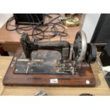 A FRISTER & ROSSMANN VINTAGE HAND CRANK SEWING MACHINE