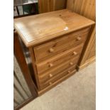 A MODERN PINE CHEST OF FOUR DRAWERS