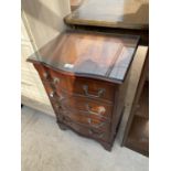 A SMALL REPRODUCTION SERPENTINE CHEST OF FOUR DRAWERS, 19" WIDE