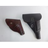 TWO LEATHER HOLSTERS
