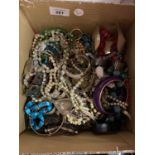 A LARGE ASSORTMENT OF COSTUME JEWELLERY INCLUDING SOME WATCHES