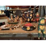 A COLLECTION OF HAND CARVED AND PAINTED CATS ETC