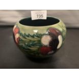 A MOORCROFT VASE ANEMONE DESIGN - SMALL CHIP TO BASE